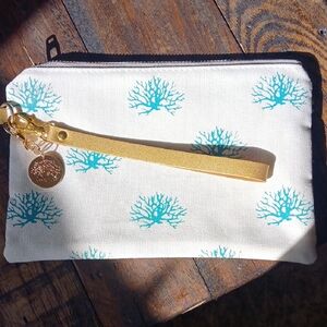 Stylish White and Teal Clutch with Gold Wristlet